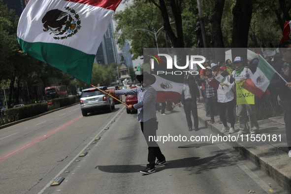 Judiciary workers block the streets near the Senate of Mexico, blocking access to legislators, while demonstrating to protest against the Ju...