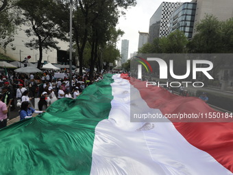 Judiciary workers block the streets near the Senate of Mexico, blocking access to legislators, while demonstrating to protest against the Ju...