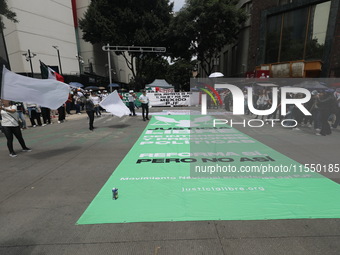 Judiciary workers block the streets near the Senate of Mexico, blocking access to legislators, while demonstrating to protest against the Ju...