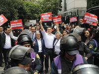 Alejandro Moreno Cardenas, National President of the Partido Revolucionario Institucional (PRI), joins the judiciary workers demonstrating t...