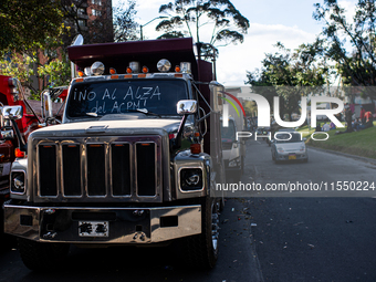 Rows of parked trucks are seen as truckers demonstrate against the increase in diesel prices in Bogota, Colombia, on September 5, 2024. (