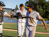 The Yolo High Wheelers celebrate clinching their spot in the 2024 Pioneer Baseball League Playoffs at Dobbins Stadium in Davis, Calif., on S...