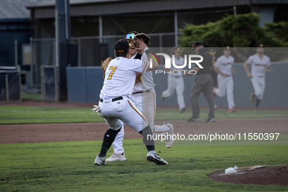 The Yolo High Wheelers celebrate clinching their spot in the 2024 Pioneer Baseball League Playoffs at Dobbins Stadium in Davis, Calif., on S...