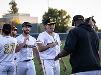 The Yolo High Wheelers celebrate clinching their spot in the 2024 Pioneer Baseball League Playoffs at Dobbins Stadium in Davis, Calif., on S...