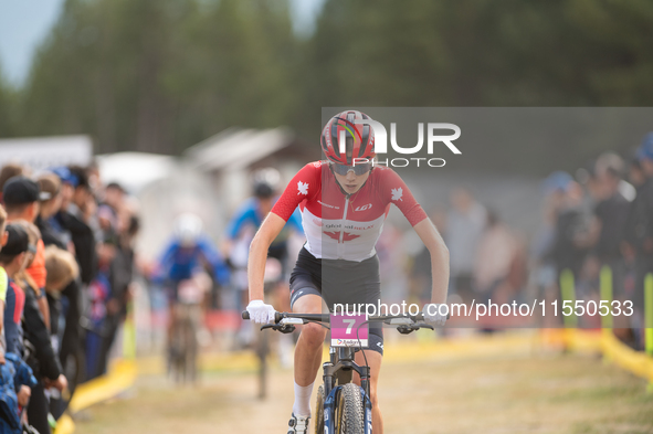 Isabella Holmgren of Canada participates in the UCI Mountain Bike World Championships Women Under 23 in Pal Arinsal, Andorra, on August 31,...