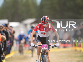 Isabella Holmgren of Canada participates in the UCI Mountain Bike World Championships Women Under 23 in Pal Arinsal, Andorra, on August 31,...