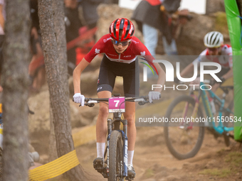 Isabella Holmgren of Canada participates in the UCI Mountain Bike World Championships Women Under 23 in Pal Arinsal, Andorra, on August 31,...