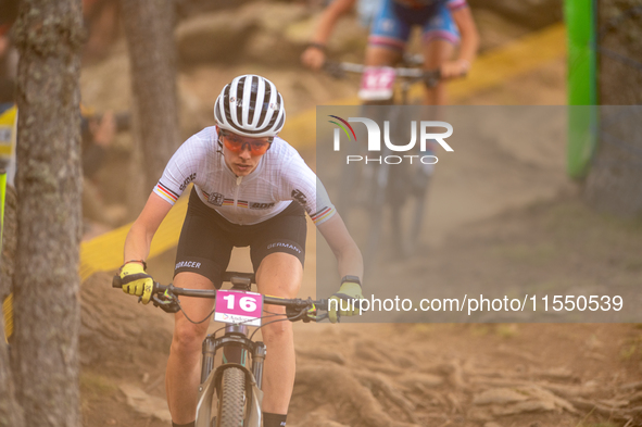 Sina Van of Germany participates in the UCI Mountain Bike World Championships Women Under 23 in Pal Arinsal, Andorra, on August 31, 2024. 