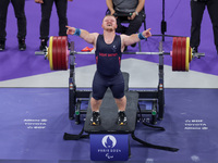 Mark Swan of Team Great Britain reacts during the Men's up to 65kg Para Powerlifting Final on day eight of the Paris 2024 Summer Paralympic...