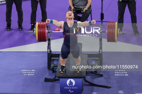 Mark Swan of Team Great Britain reacts during the Men's up to 65kg Para Powerlifting Final on day eight of the Paris 2024 Summer Paralympic...