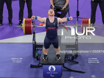 Mark Swan of Team Great Britain reacts during the Men's up to 65kg Para Powerlifting Final on day eight of the Paris 2024 Summer Paralympic...