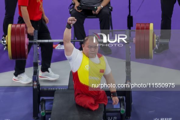 Yi Zou of Team People's Republic of China reacts during the Men's up to 65kg Para Powerlifting Final on day eight of the Paris 2024 Summer P...