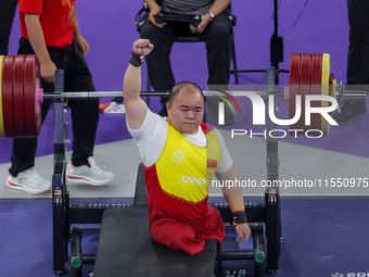 Yi Zou of Team People's Republic of China reacts during the Men's up to 65kg Para Powerlifting Final on day eight of the Paris 2024 Summer P...