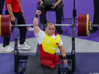 Yi Zou of Team People's Republic of China reacts during the Men's up to 65kg Para Powerlifting Final on day eight of the Paris 2024 Summer P...