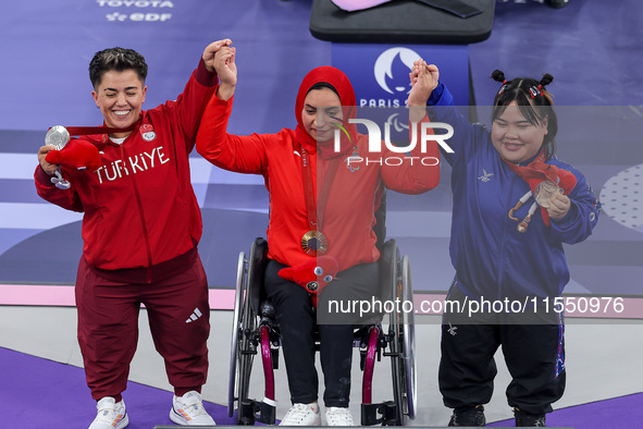 Gold medalist Rehab Ahmed of Team Egypt poses for a photo during a medal ceremony for the Women's up to 55KG Para Powerlifting Final on day...