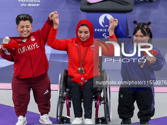 Gold medalist Rehab Ahmed of Team Egypt poses for a photo during a medal ceremony for the Women's up to 55KG Para Powerlifting Final on day...