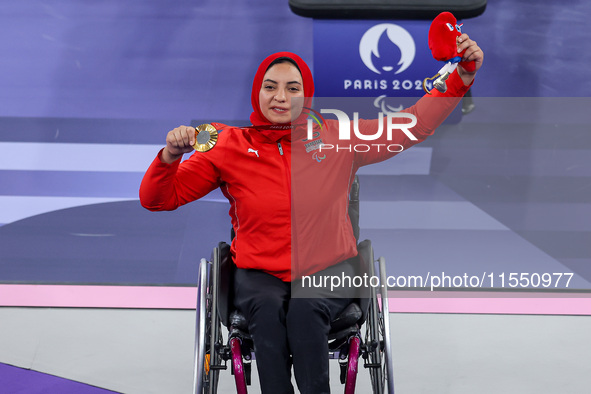 Gold medalist Rehab Ahmed of Team Egypt poses for a photo during a medal ceremony for the Women's up to 55KG Para Powerlifting Final on day...