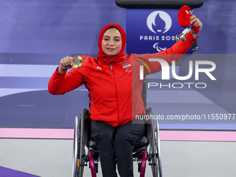 Gold medalist Rehab Ahmed of Team Egypt poses for a photo during a medal ceremony for the Women's up to 55KG Para Powerlifting Final on day...