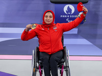 Gold medalist Rehab Ahmed of Team Egypt poses for a photo during a medal ceremony for the Women's up to 55KG Para Powerlifting Final on day...