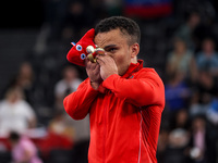 Mohamed Elmenyawy celebrates during the victory ceremony for the para Powerlifting Men's up to 59kg final event at the Paris 2024 Paralympic...