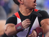 Gold medallist Egypt's Mohamed Elmenyawy celebrates at the end of the para Powerlifting Men's up to 59kg final event at the Paris 2024 Paral...