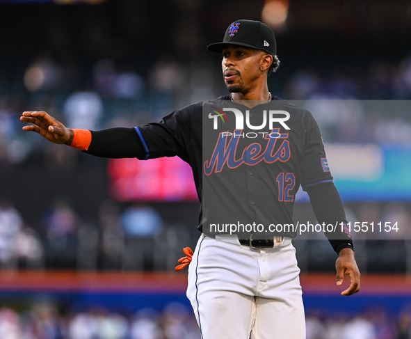 New York Mets shortstop Francisco Lindor #12 waves to fans prior to a game against the Washington Nationals at Citi Field in New York City,...