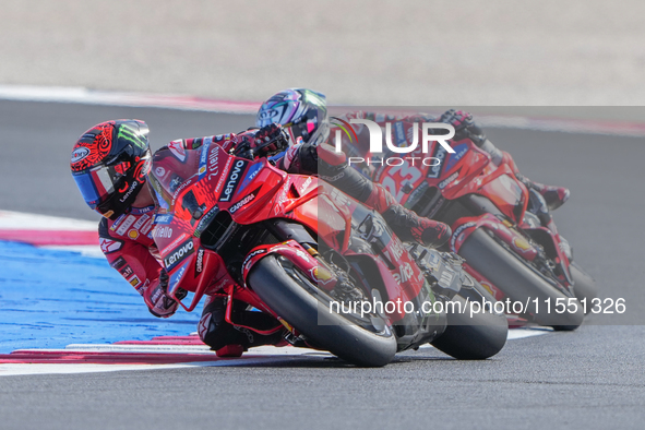 Francesco Bagnaia (Ita-Ducati Lenovo Team) and Enea Bastianini (Ita-Ducati Lenovo Team) participate in the Gran Premio Red Bull di San Marin...