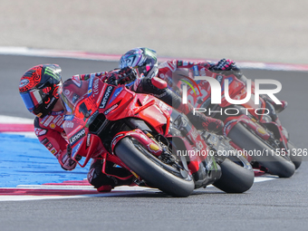 Francesco Bagnaia (Ita-Ducati Lenovo Team) and Enea Bastianini (Ita-Ducati Lenovo Team) participate in the Gran Premio Red Bull di San Marin...