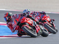 Francesco Bagnaia (Ita-Ducati Lenovo Team) and Enea Bastianini (Ita-Ducati Lenovo Team) participate in the Gran Premio Red Bull di San Marin...