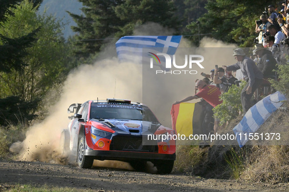 Driver Thierry Neuville and co-driver Martijn Wydaeghe of the Hyundai Shell Mobis World Rally Team, in a Hyundai i20 N Rally1 Hybrid, face t...