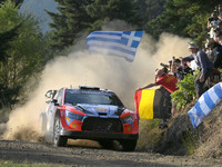 Driver Thierry Neuville and co-driver Martijn Wydaeghe of the Hyundai Shell Mobis World Rally Team, in a Hyundai i20 N Rally1 Hybrid, face t...