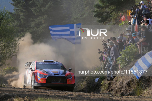 Driver Ott Tanak and co-driver Martin Jarveoja of the Hyundai Shell Mobis World Rally Team, in the Hyundai i20 N Rally1 Hybrid, face the fir...