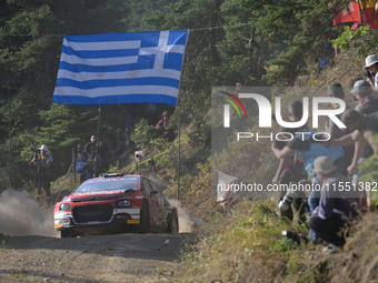 Driver Yohan Rossel and co-driver Arnaud Dunand of the team AEC - DG Sport Competition Citroen C3 face the first day of the race during the...