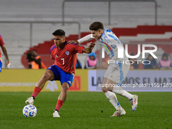 Marcelino Nunez of Chile and Julian Alvarez of Argentina are in action during the FIFA World Cup 2026 Qualifier match between Argentina and...