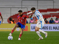 Marcelino Nunez of Chile and Julian Alvarez of Argentina are in action during the FIFA World Cup 2026 Qualifier match between Argentina and...