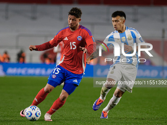 Felipe Loyola of Chile and Lisandro Martinez of Argentina are in action during the FIFA World Cup 2026 Qualifier match between Argentina and...