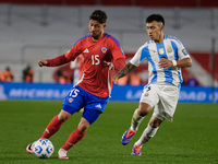 Felipe Loyola of Chile and Lisandro Martinez of Argentina are in action during the FIFA World Cup 2026 Qualifier match between Argentina and...