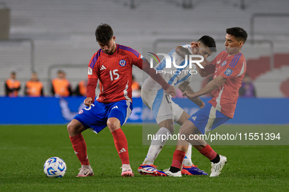 Felipe Loyola of Chile and Cristian Romero of Argentina are in action during the FIFA World Cup 2026 Qualifier match between Argentina and C...