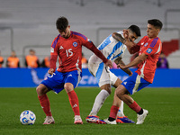 Felipe Loyola of Chile and Cristian Romero of Argentina are in action during the FIFA World Cup 2026 Qualifier match between Argentina and C...