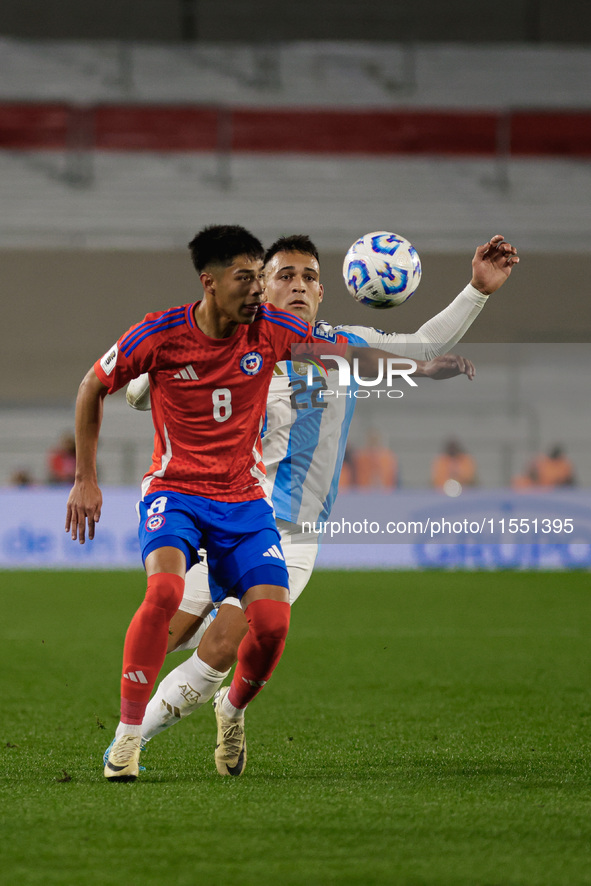 Dario Osorio of Chile and Lautaro Martinez of Argentina are in action during the FIFA World Cup 2026 Qualifier match between Argentina and C...