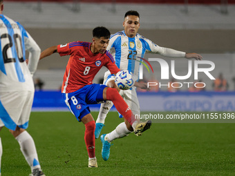 Dario Osorio of Chile and Lautaro Martinez of Argentina are in action during the FIFA World Cup 2026 Qualifier match between Argentina and C...