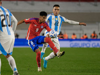 Dario Osorio of Chile and Lautaro Martinez of Argentina are in action during the FIFA World Cup 2026 Qualifier match between Argentina and C...