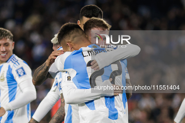 Alexis Mac Allister and Lautaro Martinez of Argentina celebrate after scoring the first goal of their team during the FIFA World Cup 2026 Qu...