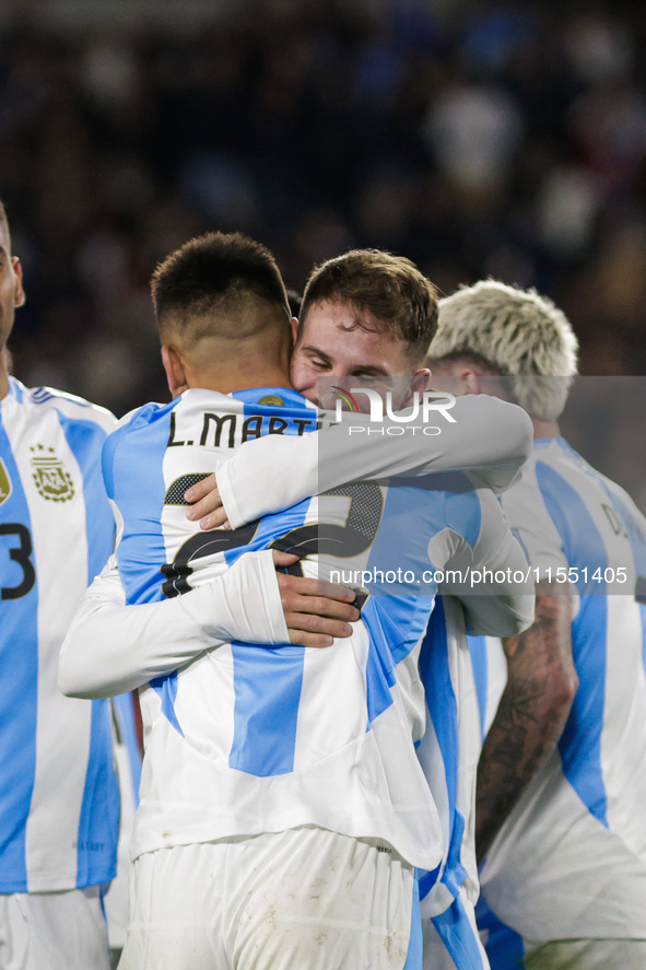 Alexis Mac Allister and Lautaro Martinez of Argentina celebrate after scoring the first goal of their team during the FIFA World Cup 2026 Qu...