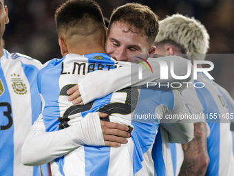 Alexis Mac Allister and Lautaro Martinez of Argentina celebrate after scoring the first goal of their team during the FIFA World Cup 2026 Qu...