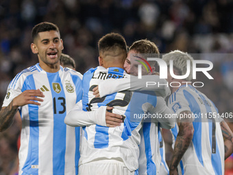 Alexis Mac Allister and Lautaro Martinez of Argentina celebrate after scoring the first goal of their team during the FIFA World Cup 2026 Qu...