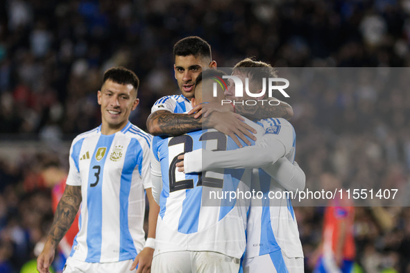 Alexis Mac Allister and Lautaro Martinez of Argentina celebrate after scoring the first goal of their team during the FIFA World Cup 2026 Qu...