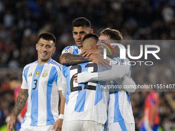 Alexis Mac Allister and Lautaro Martinez of Argentina celebrate after scoring the first goal of their team during the FIFA World Cup 2026 Qu...