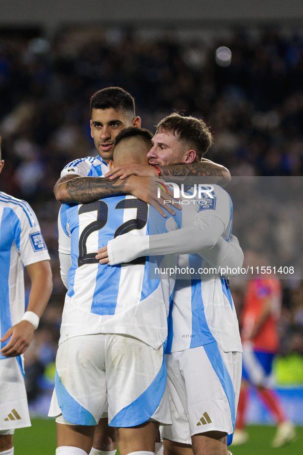 Alexis Mac Allister and Lautaro Martinez of Argentina celebrate after scoring the first goal of their team during the FIFA World Cup 2026 Qu...