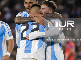 Alexis Mac Allister and Lautaro Martinez of Argentina celebrate after scoring the first goal of their team during the FIFA World Cup 2026 Qu...